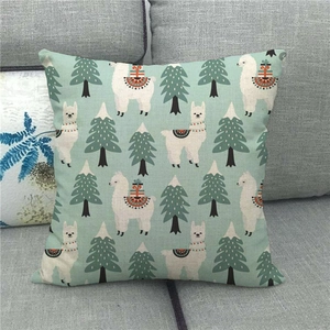 Christmas pine tree and alpaca pattern linen pillow cover on light grey sofa