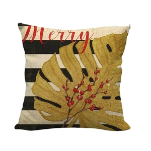 Linen pillowcase with golden palm leaf, black stripes and red Merry Christmas text