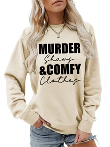 Detail of ribbed cuffs and slogan print on a beige crewneck sweatshirt for women