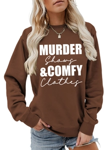Detail of ribbed cuffs and white slogan print on brown long sleeve sweatshirt