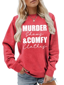 Detail showing the ribbed cuffs and white letter print on a red comfy sweatshirt
