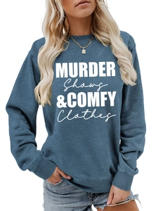Detail of the soft rib-knit neckline and white printed text on a blue comfy sweatshirt