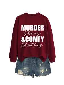 Detail of burgundy crewneck sweatshirt featuring white Murder Shows & Comfy Clothes print