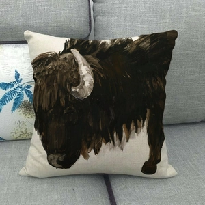 Detailed texture of linen cushion cover featuring oil painting style running bull print