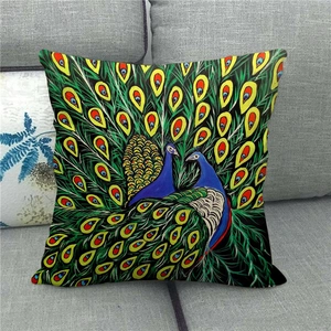 Detailed peacock oil painting style on linen pillowcase displayed on a grey sofa