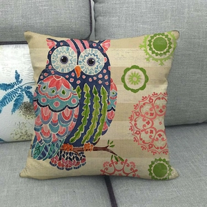 Detailed texture of linen cushion cover featuring a colorful cartoon owl and mandala pattern