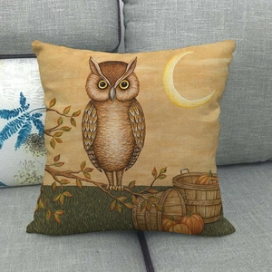 Detailed view of linen pillowcase featuring hand-drawn owl and pumpkin autumn patterns