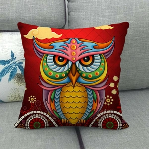Detailed texture of linen cushion cover featuring a colorful abstract owl on red fabric