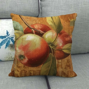 Linen pillow cover featuring a realistic red apple oil painting on a gray sofa