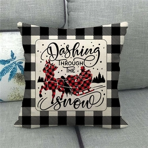 Christmas plaid pine tree linen pillow case on sofa with Dashing Through The Snow text