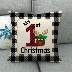 Macro detail of My 1st Christmas cushion cover with buffalo plaid edging and reindeer