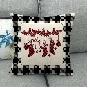 Christmas linen pillowcase with black and white buffalo plaid and festive holiday icons