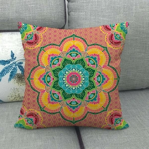 Macro detail of Bohemian linen cushion cover with colorful symmetric mandala pattern