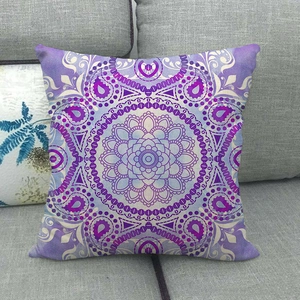 Macro shot of purple mandala pattern on textured linen fabric cushion cover