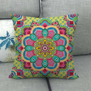 Bohemian mandala pattern square linen cushion cover on a grey sofa