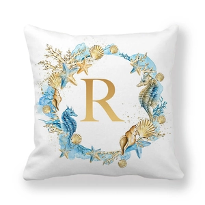 Peach skin pillowcase featuring a watercolor ocean wreath with letter R print