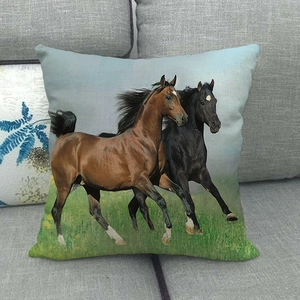 Close-up of linen cushion cover showing clear fabric texture and running horse print
