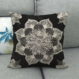 Bohemian mandala geometric pattern linen throw pillowcase on a grey sofa