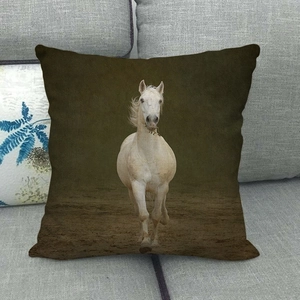 Detailed texture of linen pillowcase featuring a running white horse oil painting print
