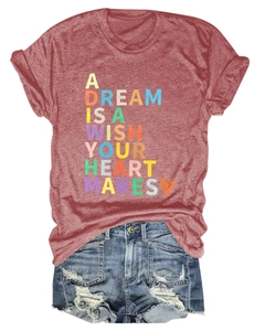 Detail of marl red T-shirt print A Dream Is A Wish Your Heart Makes and denim shorts
