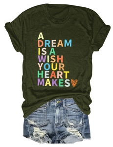 Detail of olive green tee with rolled sleeves and distressed denim shorts set