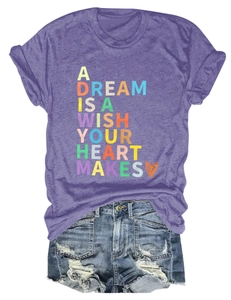 Flat lay detail of purple cotton T-shirt with heart graphic and distressed denim shorts