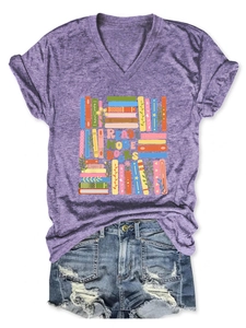 Detail of purple V-neck t-shirt with Read More Books print and distressed denim shorts