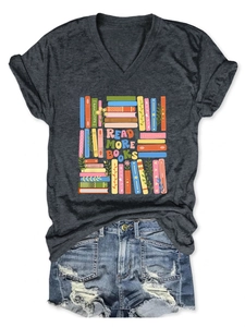 Flat lay of a grey V-neck t-shirt featuring a 'READ MORE BOOKS' design and denim shorts