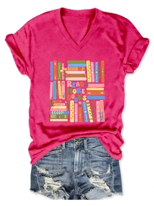Flat lay of rose red V-neck T-shirt with books print and frayed denim shorts set