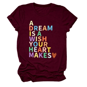Detail of burgundy cotton crew neck T-shirt with A Dream Is A Wish Your Heart Makes slogan