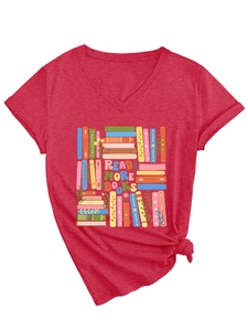 Detail of red V-neck T-shirt with 'READ MORE BOOKS' graphic and knotted hem detail