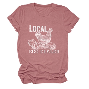 Detail of Local Egg Dealer slogan and hen graphic on vintage pink cotton t-shirt