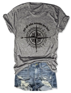 Detailed flat lay of a heather grey compass T-shirt with distressed denim shorts