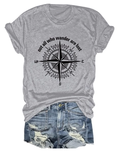 Grey T-shirt featuring a vintage compass graphic and motivational quote with denim shorts