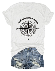 Flat lay of white T-shirt with compass print paired with frayed denim shorts