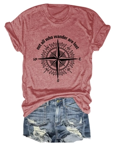 Detail of rust-red cotton T-shirt with compass print and distressed denim shorts