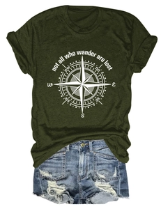 Flat lay of olive green compass graphic T-shirt and distressed denim shorts set