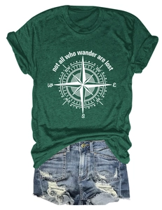 Detail of dark green t-shirt with compass print and not all who wander are lost quote