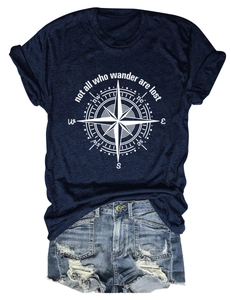 Flat lay of navy cotton t-shirt with compass print and distressed denim shorts