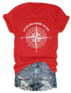 Detailed close-up of compass print and text on a red cotton blend women's t-shirt