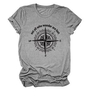 Close-up of heather gray t-shirt featuring compass print and not all who wander text