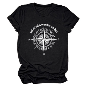 Detailed view of compass graphic and 'not all who wander are lost' print on black t-shirt