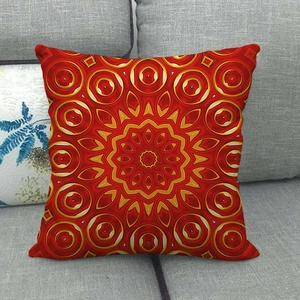 Detailed view of symmetrical red mandala geometric pattern on a square linen cushion cover