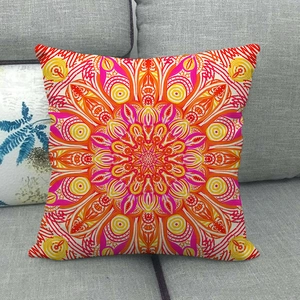 Close-up of the textured linen fabric and symmetrical Bohemian mandala pattern on the pillow