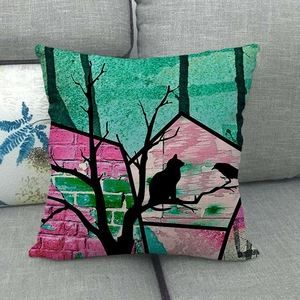 Artistic linen pillowcase with watercolor cat on tree design on grey sofa