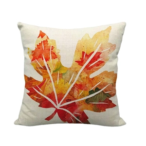 Linen fall pillow cover with colorful maple leaf print on a natural beige background