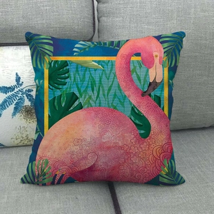Linen cushion cover featuring pink flamingo with tropical leaves on dark blue background