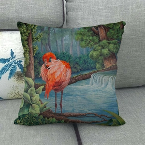 Detail of flamingo and tropical forest print on linen blend decorative pillowcase