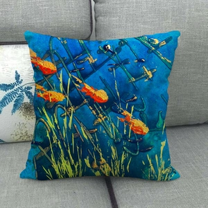 Detailed texture of linen throw pillow case featuring blue ocean fish and sea shell prints
