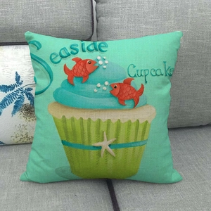 Detailed texture of seaside cupcake print on turquoise linen pillowcase for sofa
